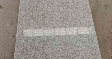 黄山芝麻白光面毛板