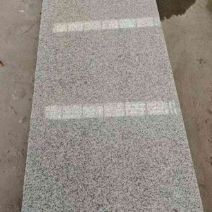 黄山芝麻白光面毛板